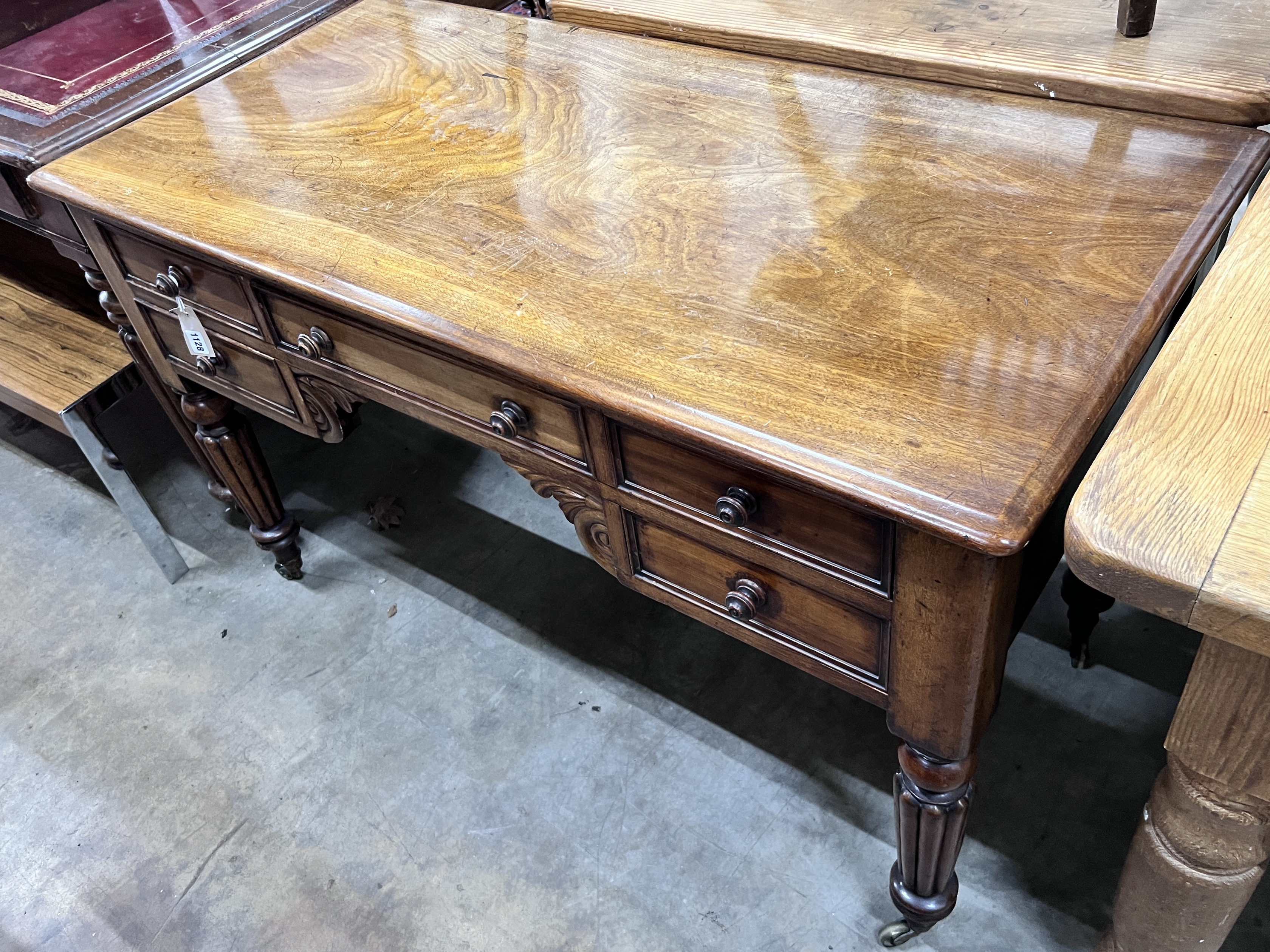 A mid Victorian mahogany kneehole dressing table, width 120cm, depth 59cm, height 75cm